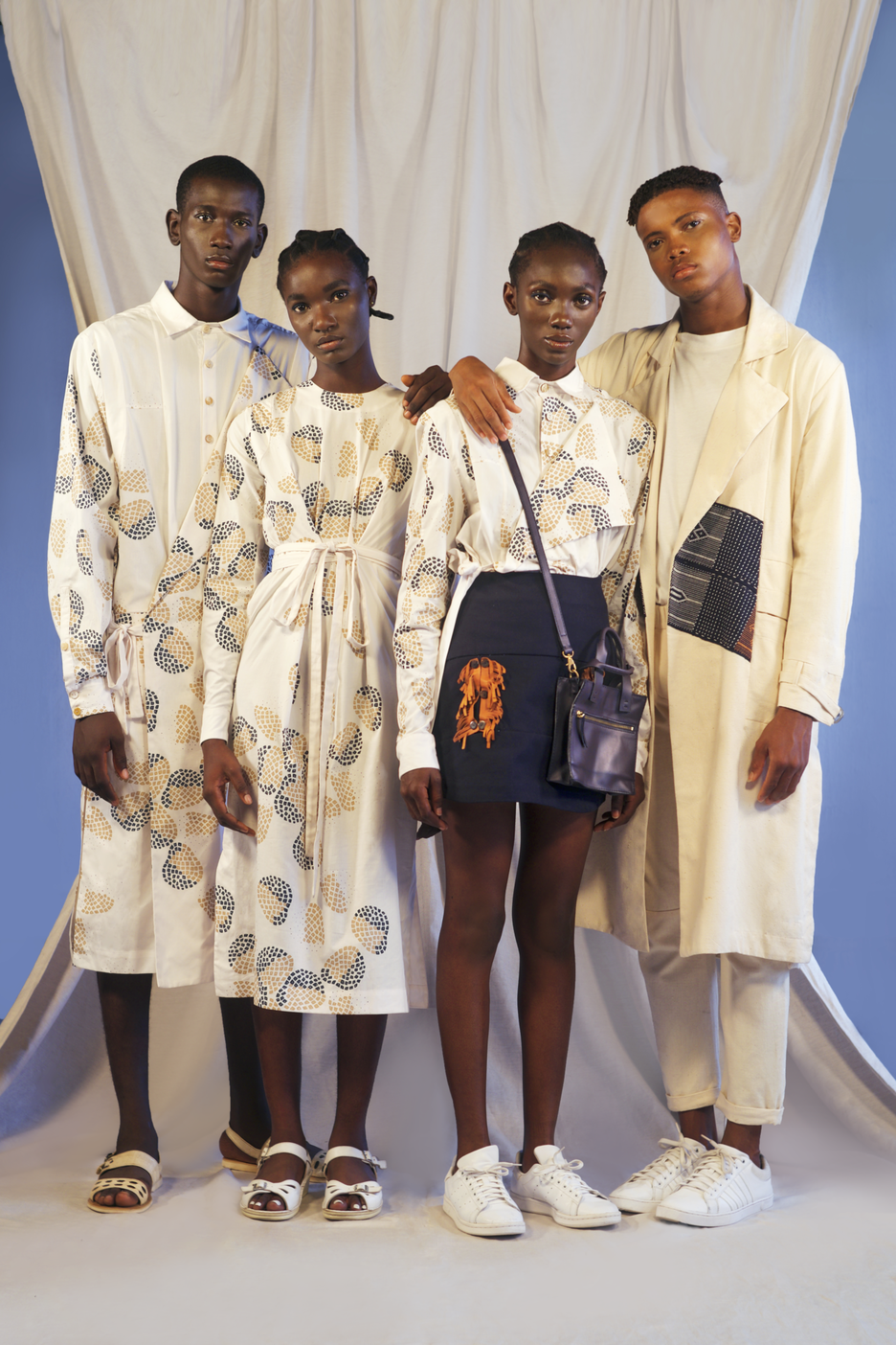 Four models in Kenyan designed clothing