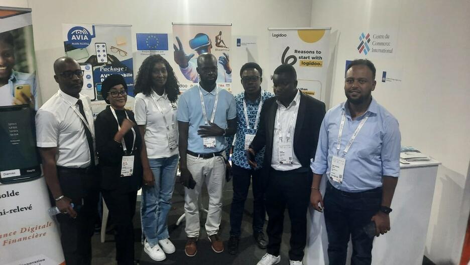 African entrepreneurs at conference booth