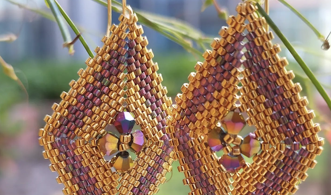 Close-up of golden beaded earrings