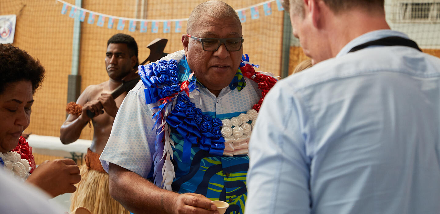 President of Fiji in floral top speaks with business leaders